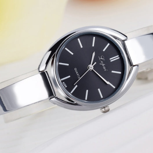 Luxury Womens Bracelet Watch, Waterproof with a sleek black dial and silver bracelet design